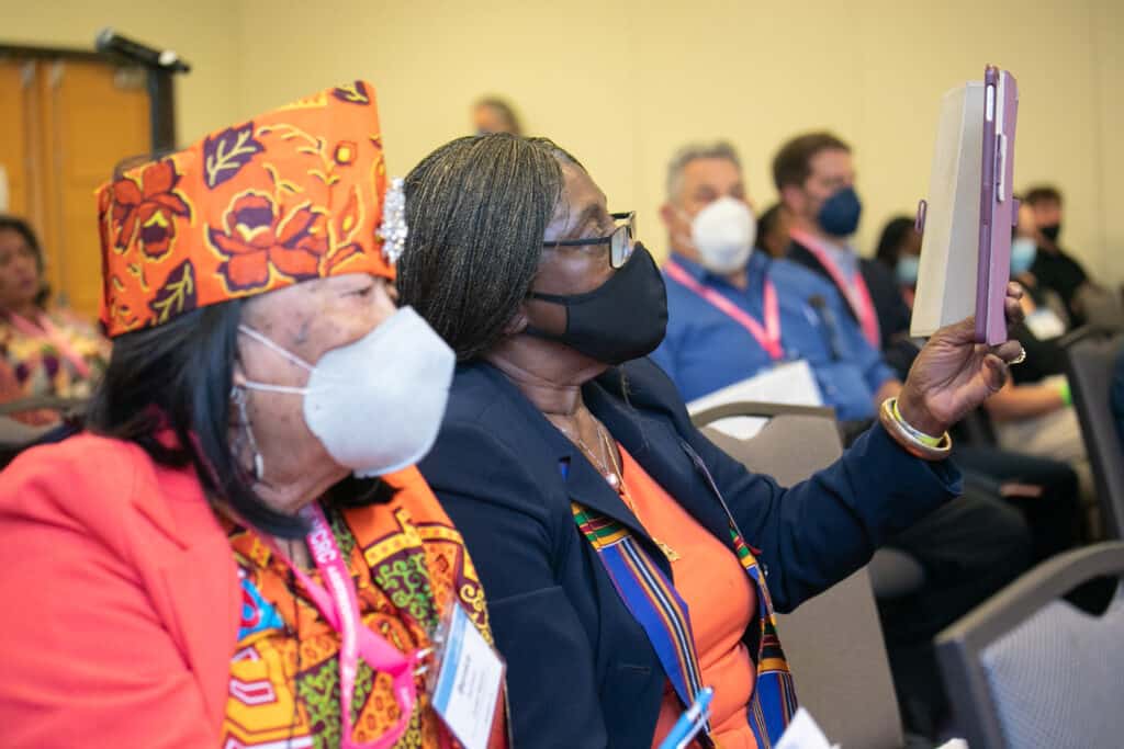 Conference attendees listen to a breakout session at the 2022 Just Economy Conference.